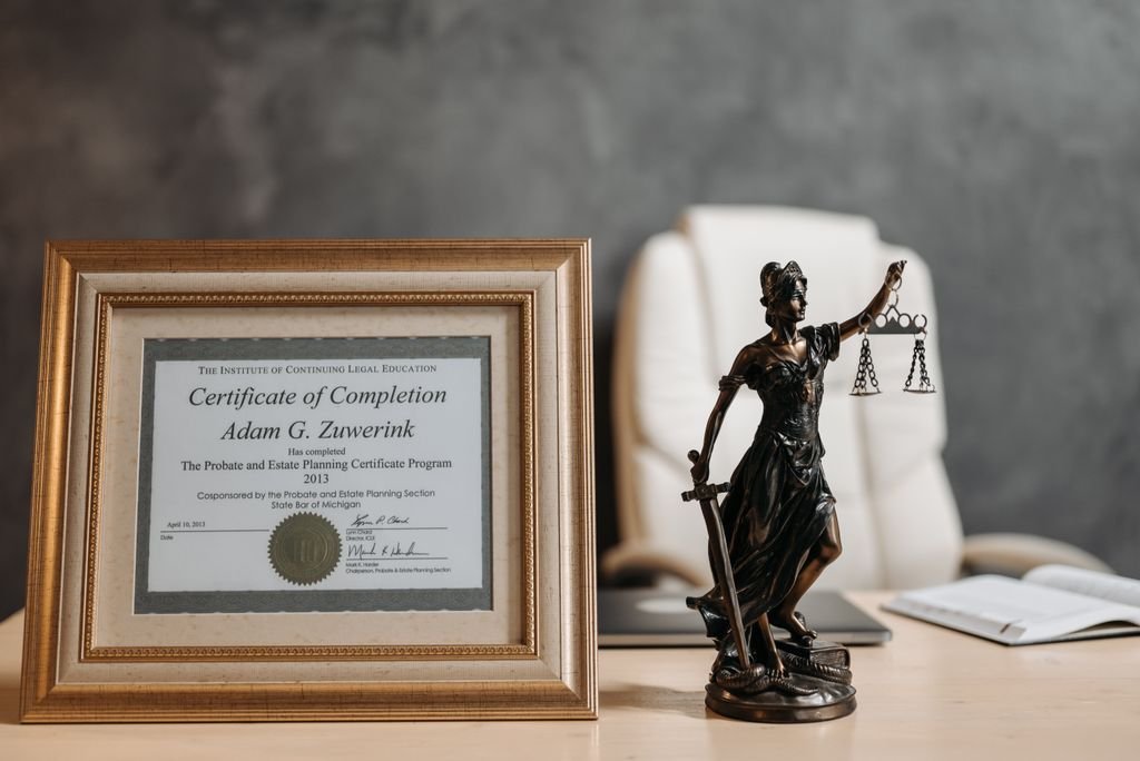 What Is Ancillary Probate? When a Second Estate Case Is Required Framed certificate and a statue holding scales of justice