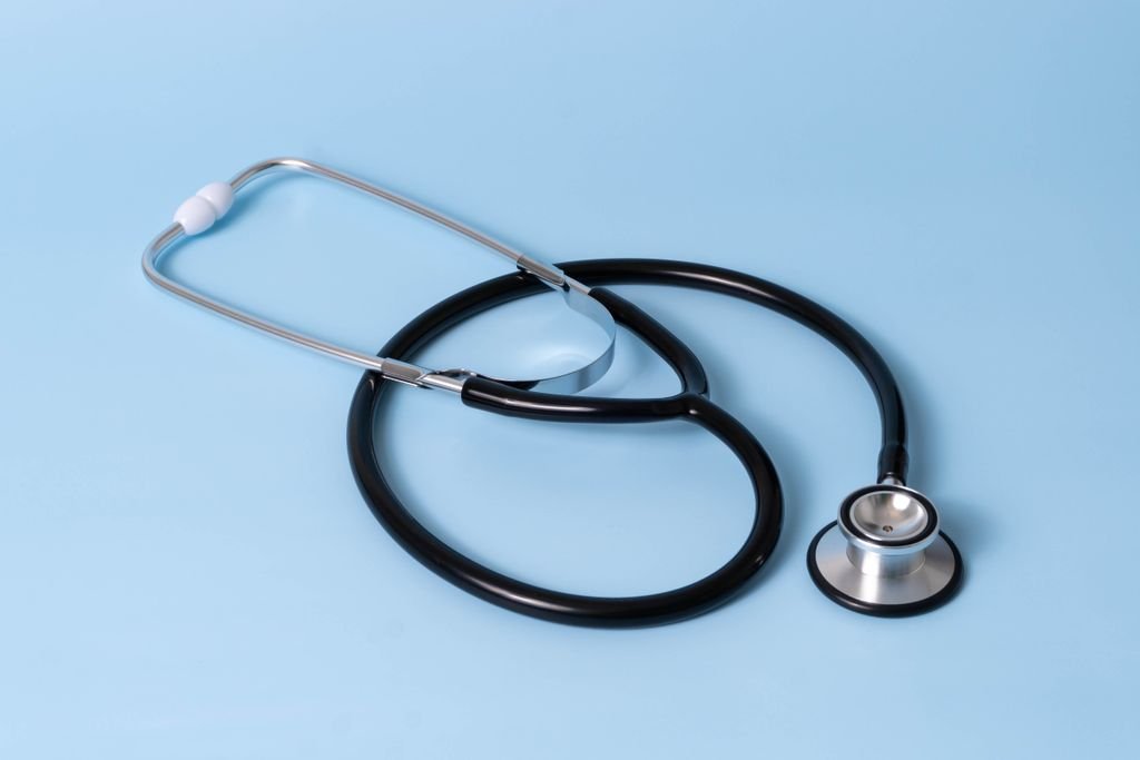 Stethoscope on a blue surface