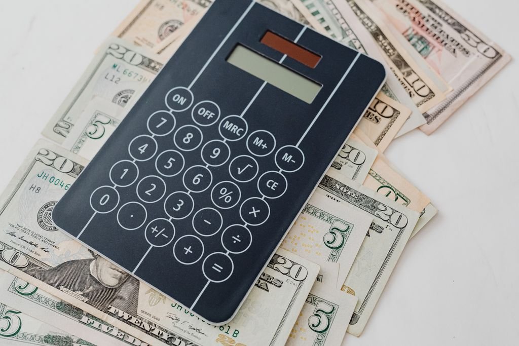 Tax Equivalent Yield: How to Compare Tax-Free and Taxable Returns Calculator on U.S. dollar bills
