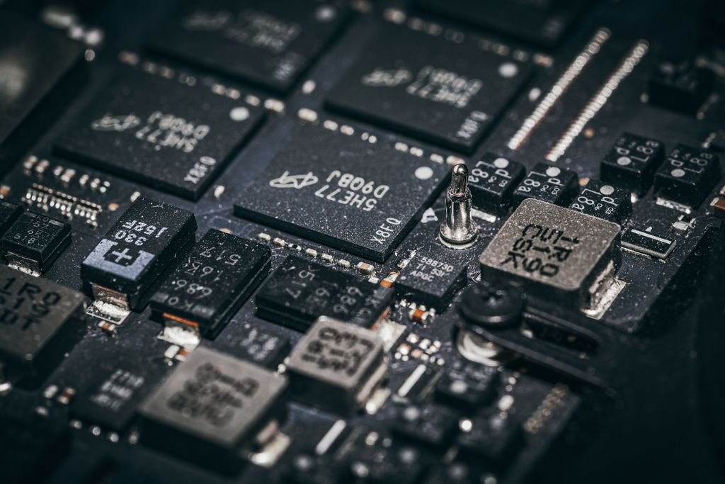 Close-up of computer microchips and circuitry representing technology investments